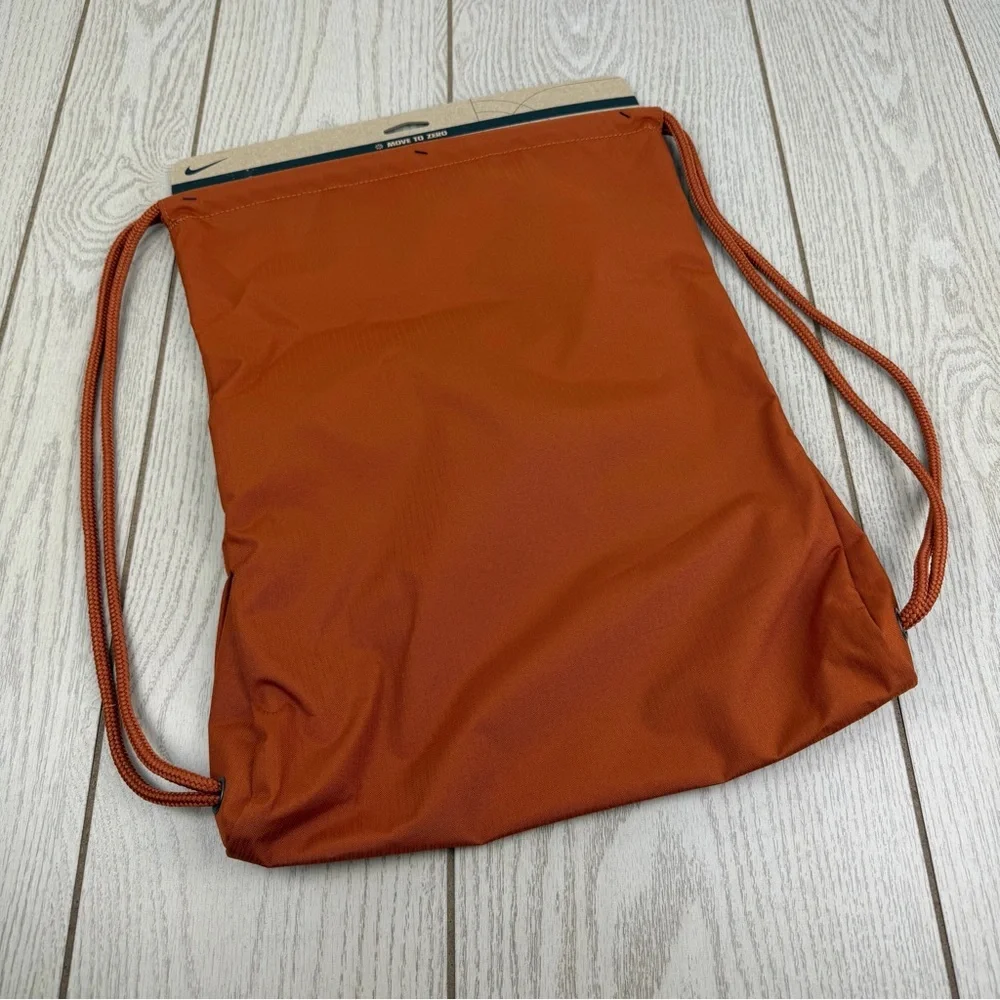 Nike Kids Drawstring Bag (12L) One Size Medium Orange Ombre Graphic $21